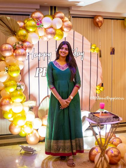 We love it when our clients become part of the decor! A happy client posing with the setup we created for her 23rd birthday.