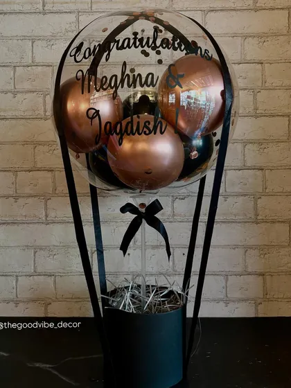 Celebrating a special union with this custom congratulations Bobo Box. The design uses a chic black and rose gold color scheme with a personalized message for the happy couple, Meghna and Jagdish.