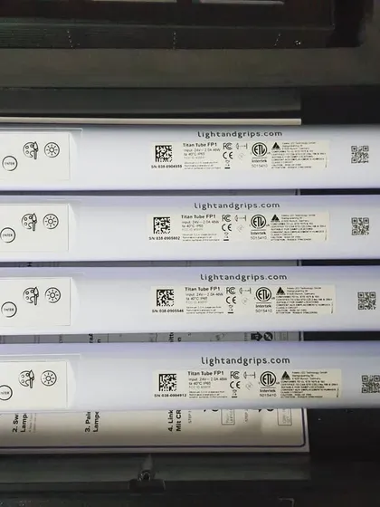 A case of Astera Titan Tubes, fully charged and ready for a shoot. These wireless, battery-powered LED tubes are essential for creating dynamic lighting effects, accent lighting, or rigging in tight spaces.