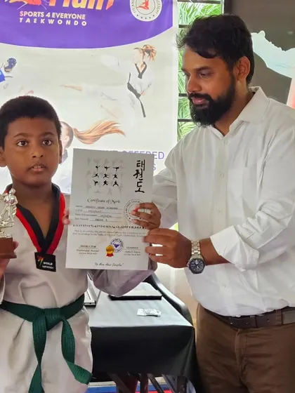 We recognize excellence. Rashid is awarded the 'Best Fighter' trophy at our 2024 belt promotion exam for his outstanding performance.