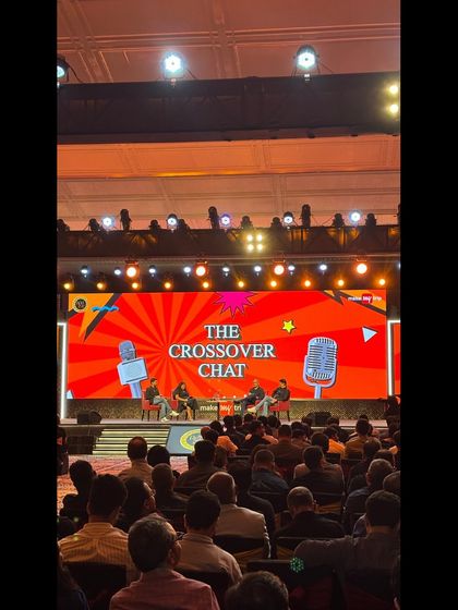 A panel discussion, 'The Crossover Chat', in progress at the MakeMyTrip Red Carpet Awards.