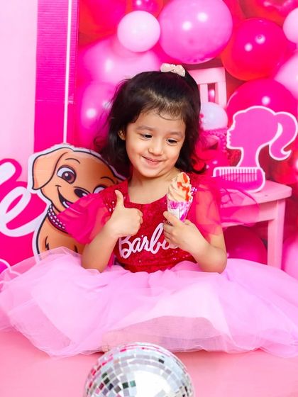 Even Barbie needs a snack break. This candid moment of her enjoying a treat adds a touch of sweetness and reality to the fantasy.