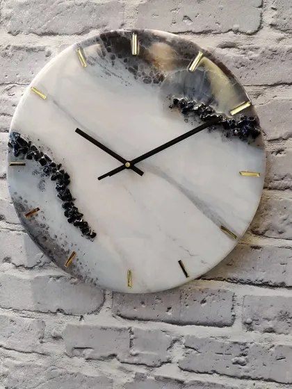 This handmade clock is not just a timepiece, it's a unique piece of art that cannot be exactly replicated.