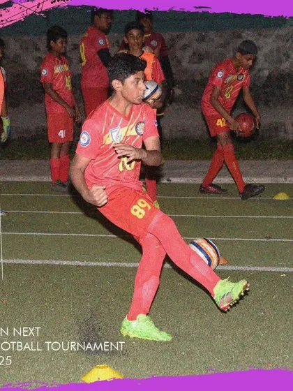 A player practicing a skill drill during the GenNext Football Tournament.