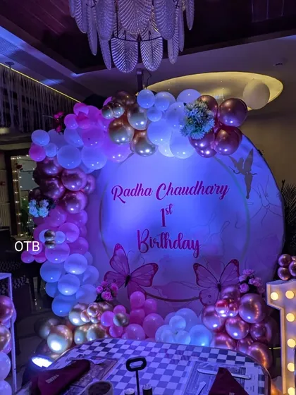 This wide shot shows the full first birthday setup in the venue. I can work with you to make sure the decor complements the space perfectly.