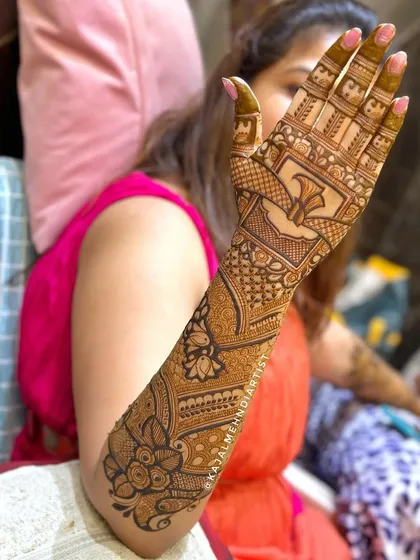A side view of a full floral bridal backhand design.