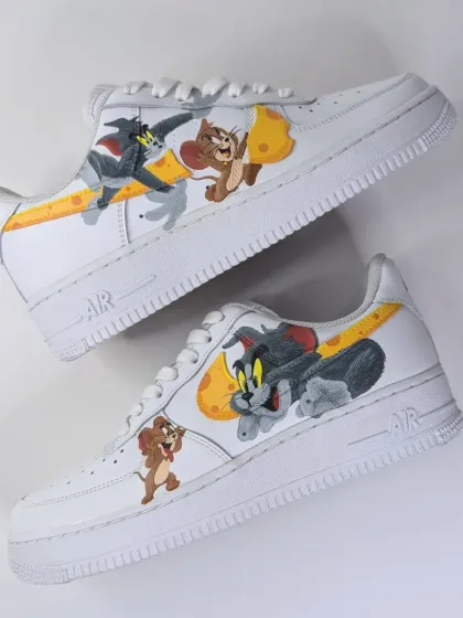A throwback to the classics with this Tom and Jerry custom on a Nike Air Force 1. I designed the Nike swoosh to look like a slice of cheese, bringing the whole cat-and-mouse chase to life right on the sneaker.