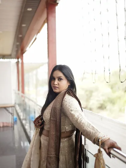 Another beautiful shot of the sister of the bride. The complete look is sophisticated and perfect for a key member of the wedding party.