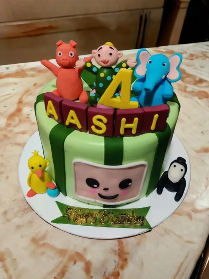A Cocomelon-themed cake perfect for a toddler's birthday. It features JJ and his animal friends in bright, cheerful colors that kids love.