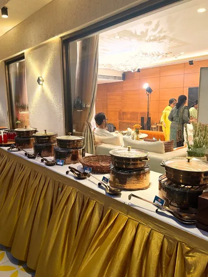 Another angle of the elegant home buffet setup, showing how it integrates beautifully with the client's decor.