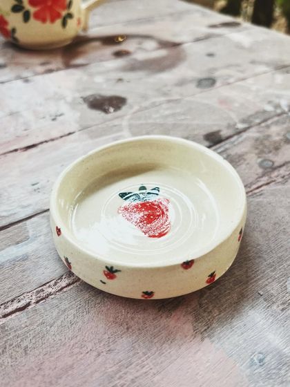 Look at the beautiful creations from this student who completed the intense potter's wheel course. Each piece is a masterpiece, adorned with colorful glazes and intricate, hand-painted details.