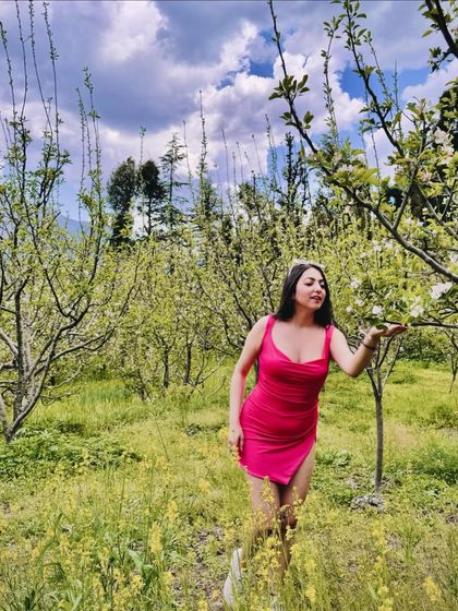 Feeling like a doll in this pink mini dress amidst the apple blossoms. This shot is all about romanticizing life and finding beauty in nature.