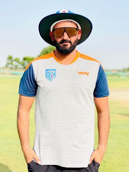 Enjoy the game and chase your dreams. A photo of me on the field, in my coaching attire.