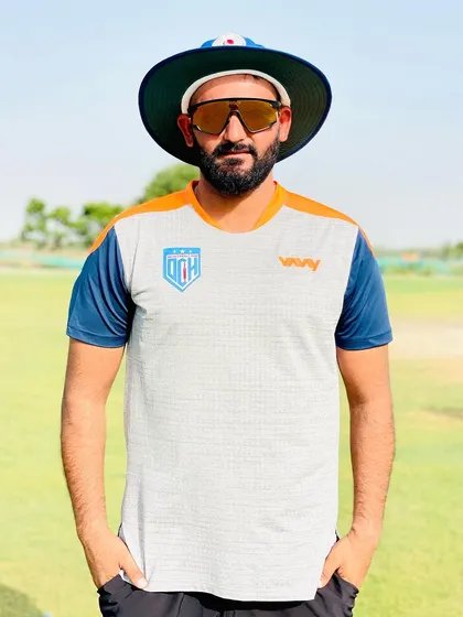 Enjoy the game and chase your dreams. A photo of me on the field, in my coaching attire.