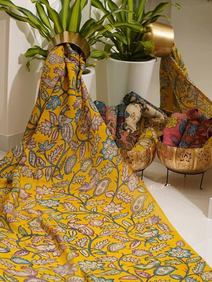 This is a glimpse into my Kalamkari Edition, featuring a wide array of hand-painted dupattas and fabrics from the Indralokam series. Each piece is a unique story, available for you to customize into your dream outfit.