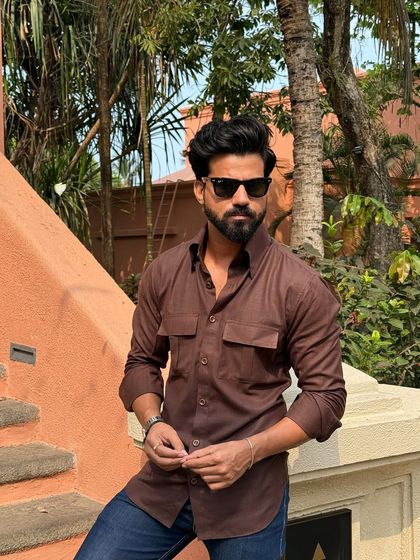 A close-up shot that highlights the shirt's fabric and the details of its double-pocket design.