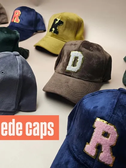 Style it with your initial. Our custom suede caps are a trendy accessory for anyone. We offer them in a variety of colors with personalized sequin letters, making them a great standalone gift or a cool addition to any hamper.