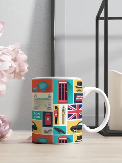 A trip to London in a mug. This colorful mug features iconic London landmarks and symbols, making it a perfect gift for a travel enthusiast.