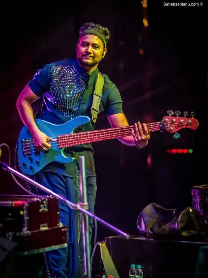 Our bassist laying down a smooth groove. Our versatile sound can be both high-energy and sophisticated, perfect for corporate audiences.