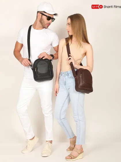 This shot features both male and female models to showcase a unisex sling bag collection. It's an effective way to demonstrate product versatility and broaden audience appeal.