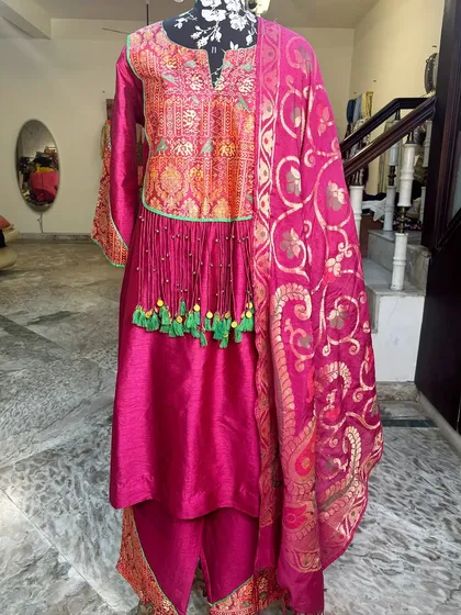 One of my favorite outfits of all time. The tassels and the rich colors make this suit set so festive and fun.