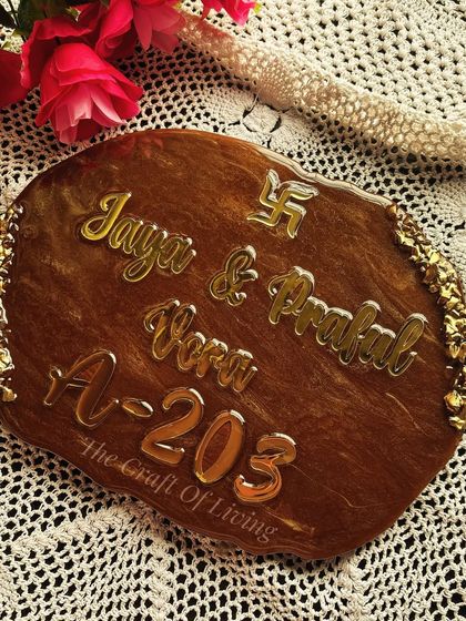 Another view of the beautiful, custom-made resin nameplate, showcasing its glossy finish and elegant design.