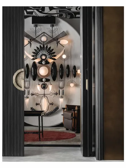 This is the pièce de résistance of the Aria project. We designed the space around this majestic Totem light installation, creating a focal point that is both a source of light and a piece of sculptural art. The fluted sliding doors open to reveal this dramatic centerpiece.