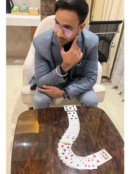 A moment of focus with my cards before a show. Preparation is everything.
