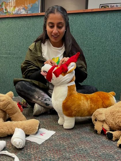 Practicing pet first aid during my certification course. We are prepared for everything and take the health and safety of the dogs in our care very seriously.