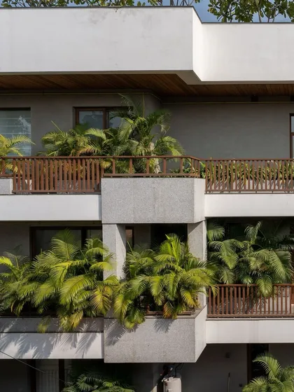 These balconies, filled with plants, act as a green buffer for the building. They not only add to the aesthetic but also help cool the air and provide a pleasant micro-environment for residents.