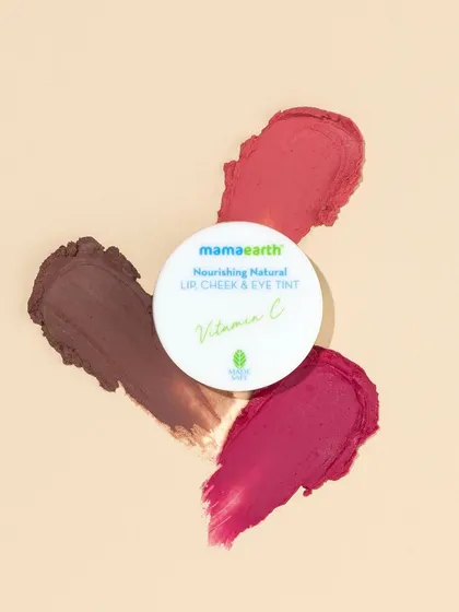 Texture is everything. This flatlay showcases the rich pigments and smooth application of these lip and cheek tints. The swatches are deliberately imperfect to feel authentic and touchable.