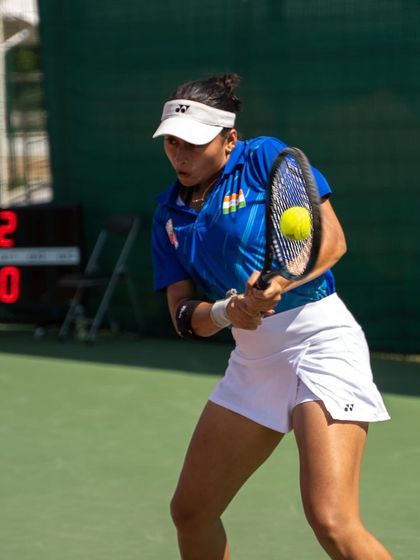 Akanksha in full flight, executing a powerful backhand during the BRICS Games. This action shot highlights the discipline and skill that earned her a bronze medal.