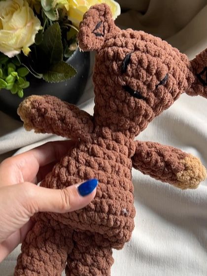 A close-up of our Mr. Bean's Teddy. We hand-stitch the features to give it that classic, well-loved look.