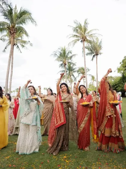 The bride's family ready to welcome the groom. I help plan and choreograph these small but meaningful moments, like this coordinated welcome dance, to make the entire event feel special.