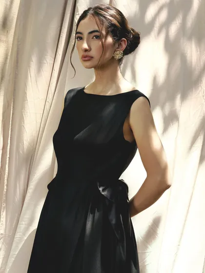 Classic and timeless. For this fashion shoot, I created an elegant look with a soft updo, defined eyes, and a neutral lip color to complement the sophisticated black dress.