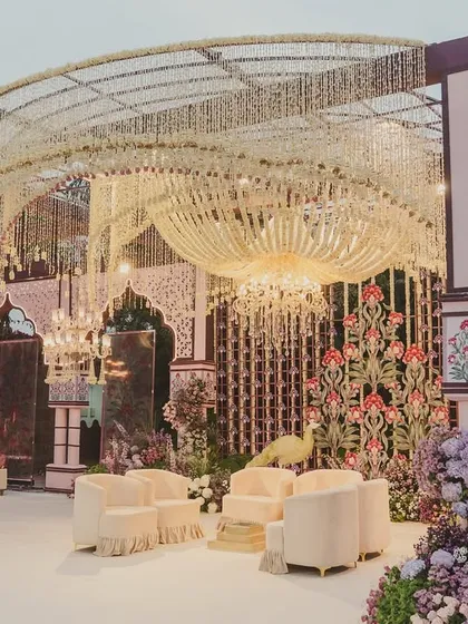 The mandap design for this Udaipur wedding was breathtaking. We created a massive, intricate floral chandelier that cascaded over the ceremony, making the space feel both grand and intimate.
