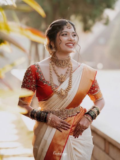 The bride's joyful, candid laughter. This portrait captures her personality and the pure happiness of her wedding day, making for a truly radiant image.
