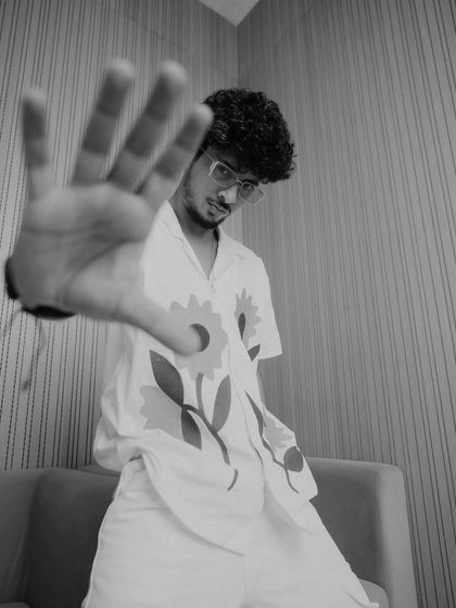 Another promotional look for the 'Kota Factory' cast. This playful co-ord set with a floral print is a great example of fun and contemporary men's fashion.