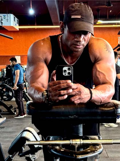 The mind is everything. What you think, you become. A moment of focus before the next set.