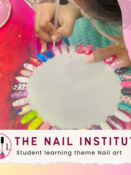 Students learn to create themed nail art, practicing different designs on a color wheel to build their portfolio of styles.