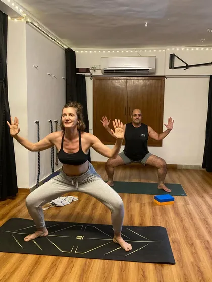Goddess pose in our evening class. This posture is fantastic for strengthening the quads, glutes, and inner thighs while opening the hips.