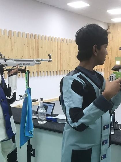 Our young shooters preparing for the National match challenge, demonstrating impressive form and focus.