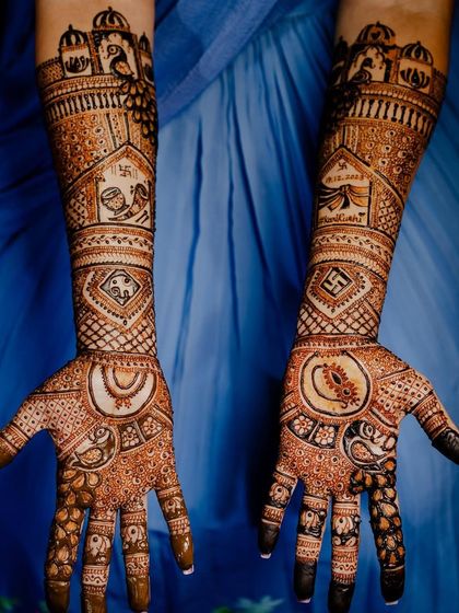 This design features palace architecture with peacocks, along with a wedding procession (baraat) and swastika symbols.