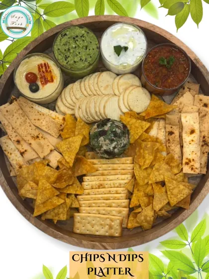 Another view of my popular Chip 'n' Dip platter, featuring a variety of crunchy snacks and four different homemade dips. It's a gourmet take on a classic party snack.