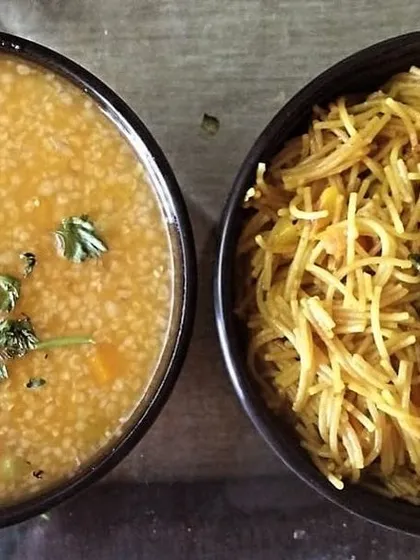 A healthy breakfast combo of Veg Daliya (savory cracked wheat porridge) and Vermicelli Upma.
