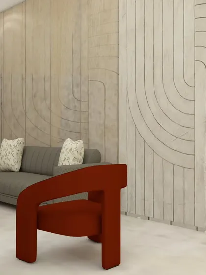 A 3D design for a living and dining room at ATS Nobility, Noida Extension. The textured wall panel with curved grooves and bold red accent chairs create a modern and artistic statement.
