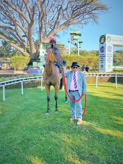 English Bay, with jockey A.R. Pradeep, after winning The Vidhana Soudha Trophy.