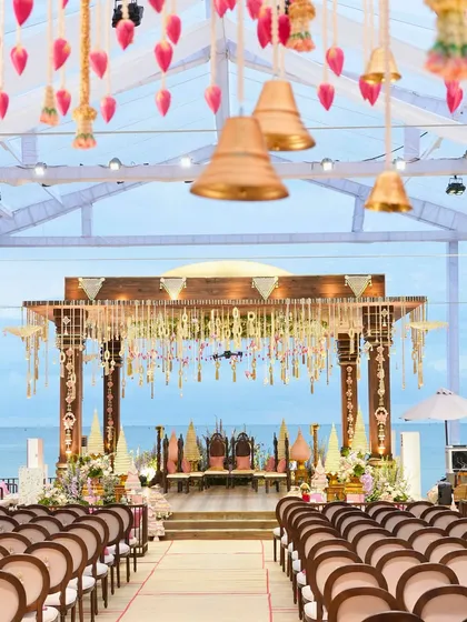 Your wedding ceremony, set against the sea. For this destination wedding in Phú Quốc, Vietnam, we designed and built a beachfront mandap that felt both traditional and open to the coastal air. We handle all logistics, so you can have your dream wedding anywhere in the world.