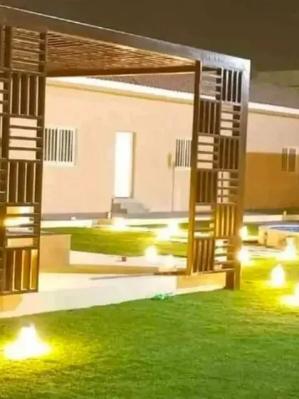 We transformed this terrace into a sophisticated evening retreat. This project features a custom-designed wooden pergola, perfectly manicured artificial grass, and strategically placed accent lighting to create a warm and inviting atmosphere for relaxation or entertainment.