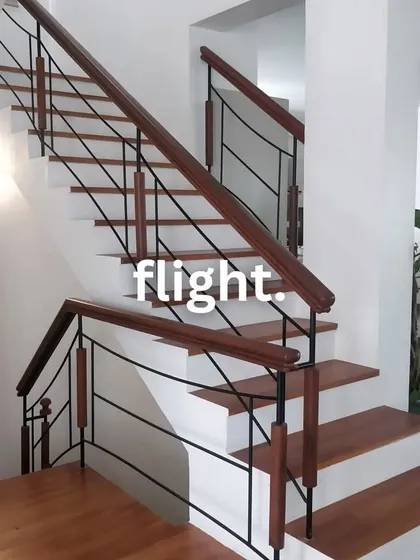A staircase is more than just a way to get from one floor to another; it's a central feature of a home. We designed this flight with a mix of warm wood and clean black metal for a modern yet timeless look.